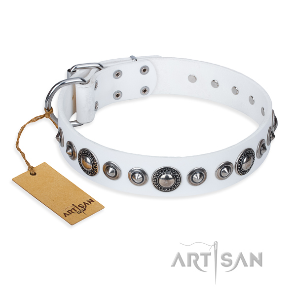 Natural genuine leather dog collar made of soft to touch material with strong hardware