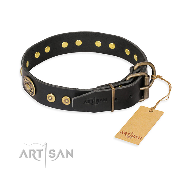 Leather dog collar made of gentle to touch material with strong adornments